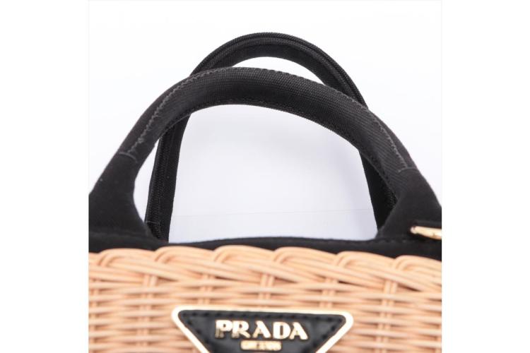 Sold at Auction: Prada Milano Basket Weave Clutch Bag