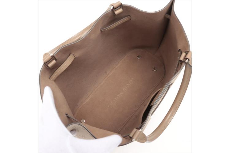 Louis Vuitton, Bags, Louis Vuitton Girolata Handbag Mahina Leather  Neutral