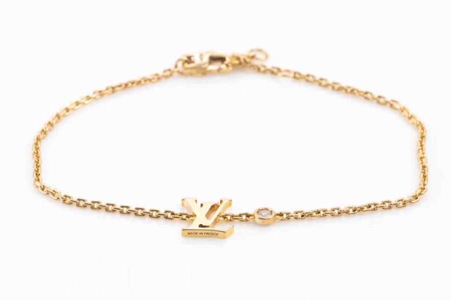 Sold at Auction: LOUIS VUITTON IDYLLE BLOSSOM LV BRACELET, YELLOW GOLD